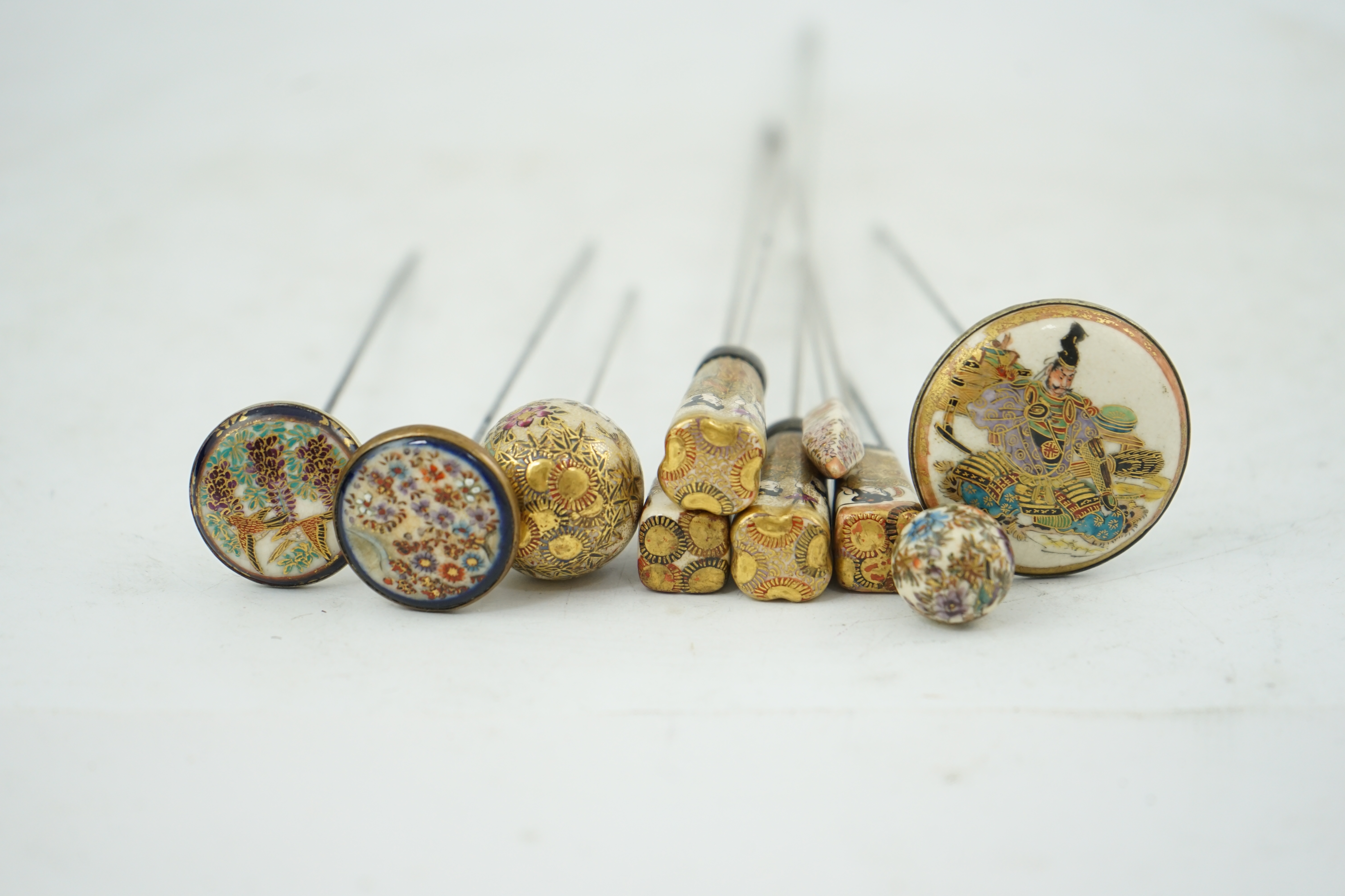 A group of ten Japanese Satsuma topped hair pins, early 20th century